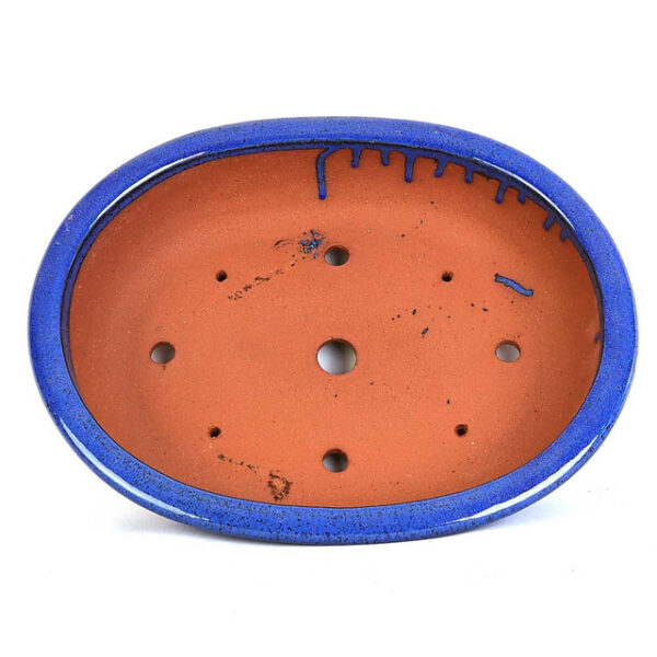 Elevate your garden with our 15" Handmade Oval Pot in Blue. Perfect for showcasing plants beautifully, crafted for durability and aesthetic appeal.